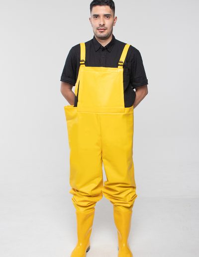 Man wearing a waterproof plumber overall
