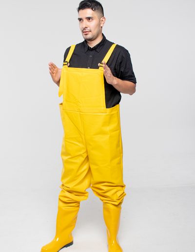 Man wearing a waterproof plumber overall