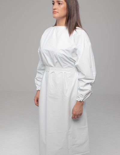 Woman wearing a white waterproof gown