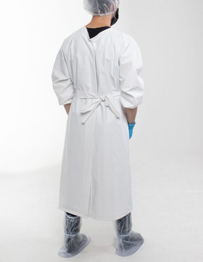 Man from behind wearing a white waterproof gown