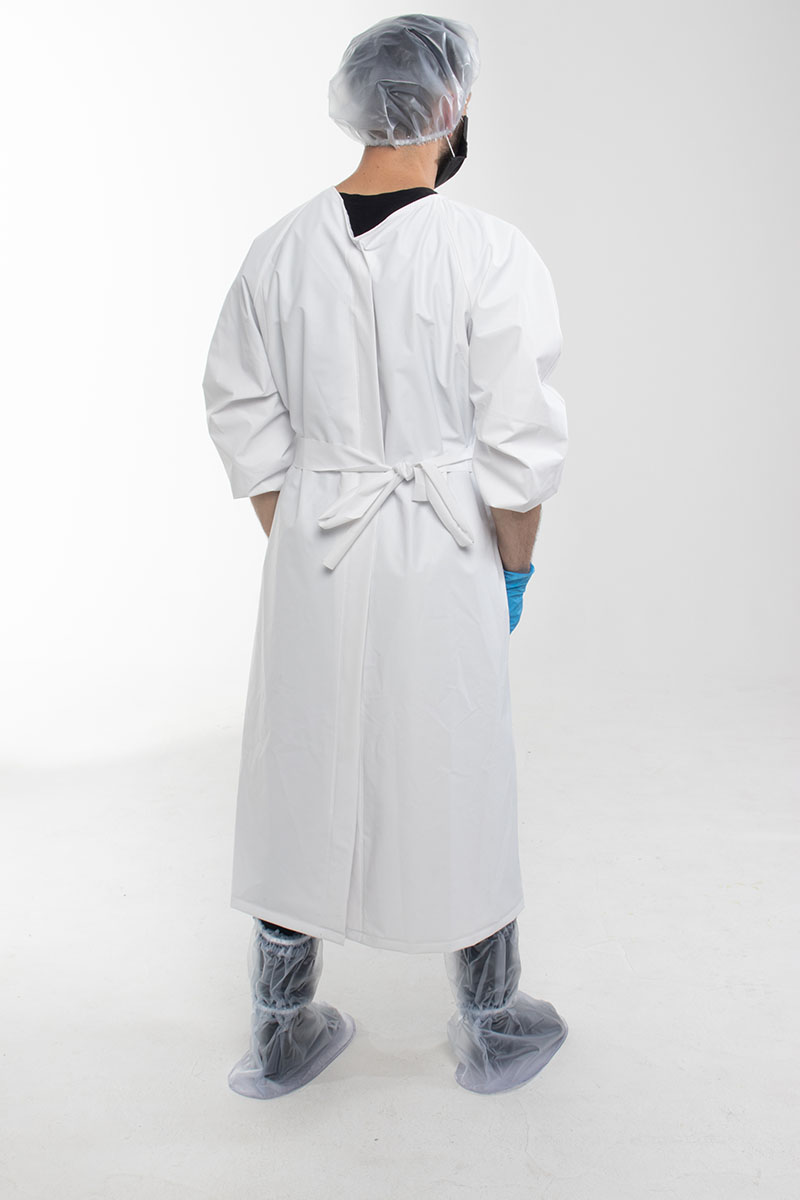 Man from behind wearing a white waterproof gown