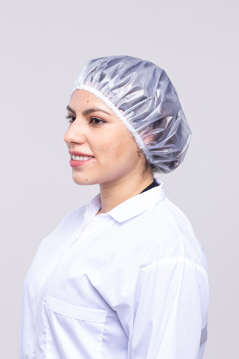 Woman wearing a waterproof cap