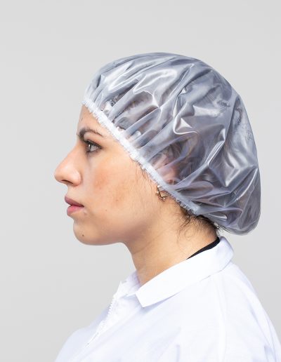 Woman wearing a waterproof cap