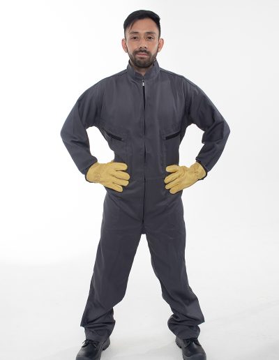 Man wearing a one-piece drill work outfit