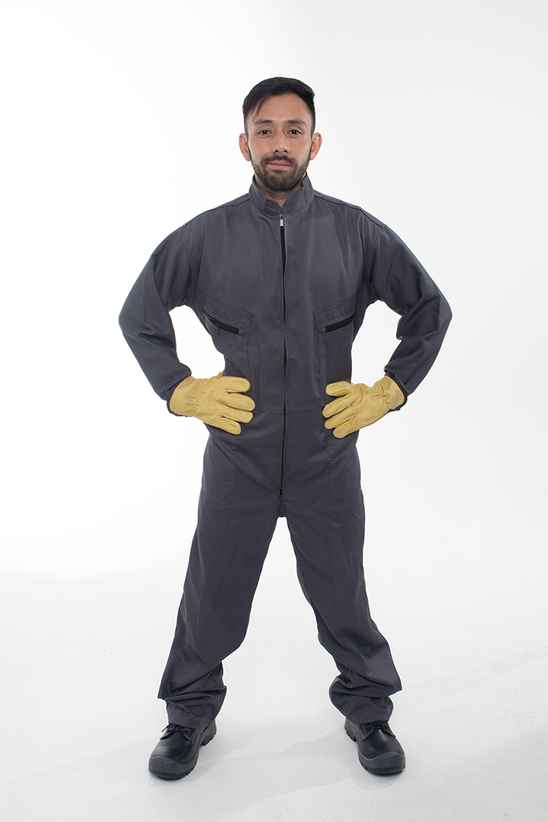 Man wearing a one-piece drill work outfit