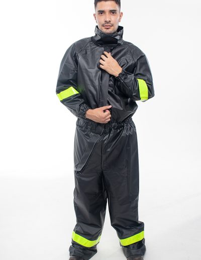 Man wearing a one-piece motorcycle rain suit