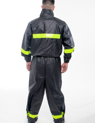 Man from behind wearing a one-piece motorcycle rain suit