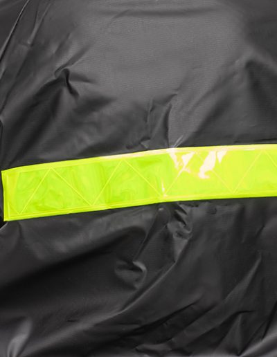Back detail of a one-piece motorcycle rain suit