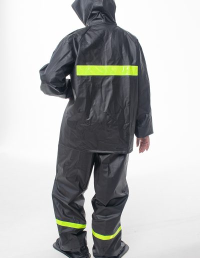 Woman from behind wearing a 4-piece motorcycle rain suit