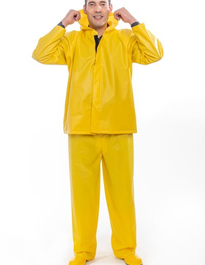 Man wearing a two-piece waterproof suit with velcro and zipper