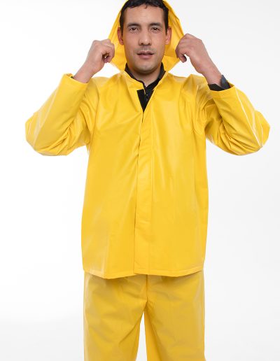 Man wearing a two-piece waterproof suit with velcro and zipper