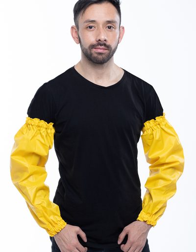 Man wearing yellow waterproof sleeves