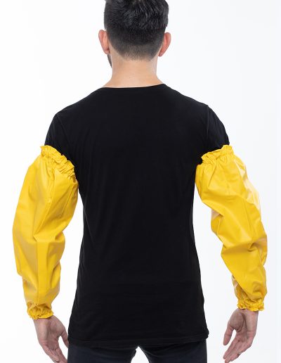 Man wearing yellow waterproof sleeves from the back