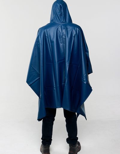 Man from behind wearing a blue waterproof poncho
