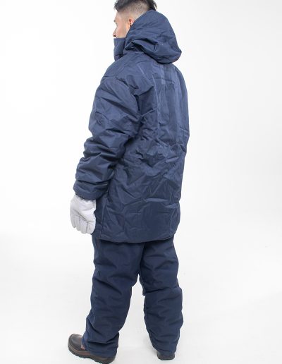 Man wearing a cold room suit