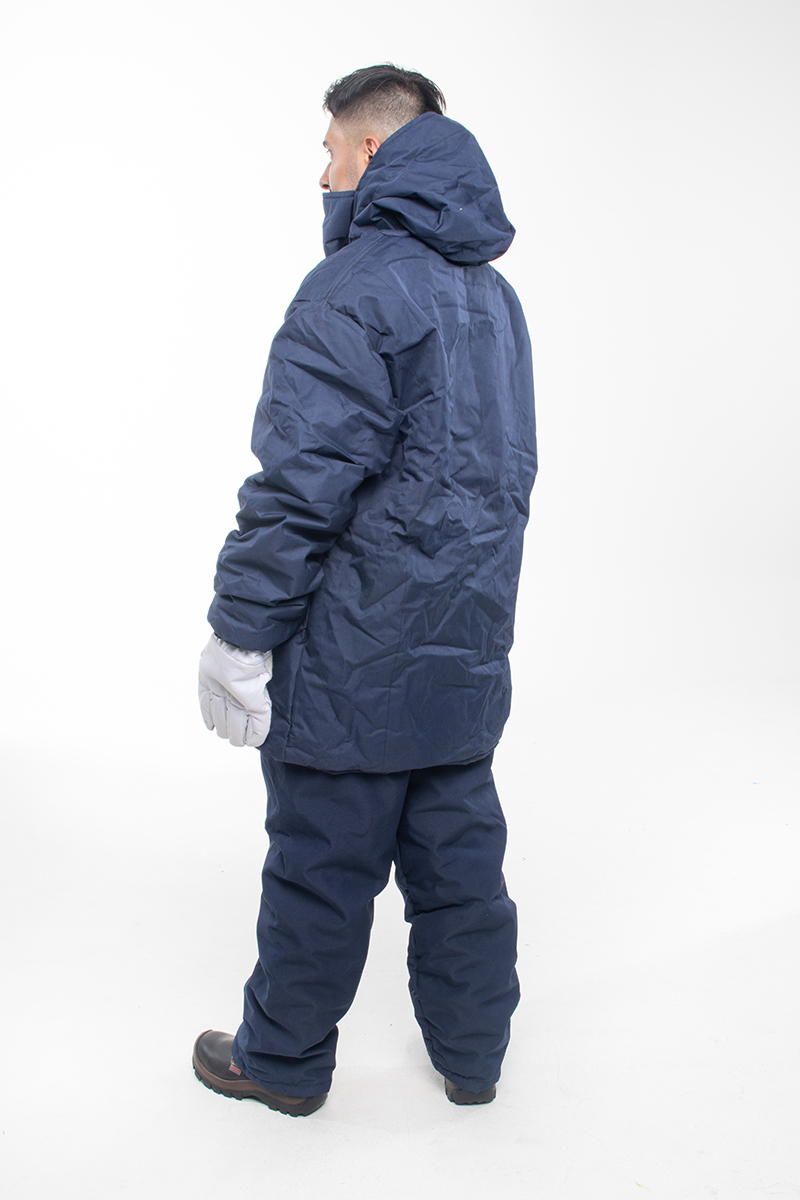 Man wearing a cold room suit