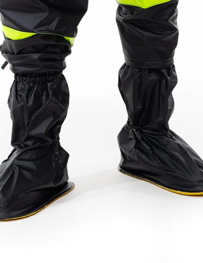 Detail of the boot covers of a 4-piece motorcycle rain suit for women