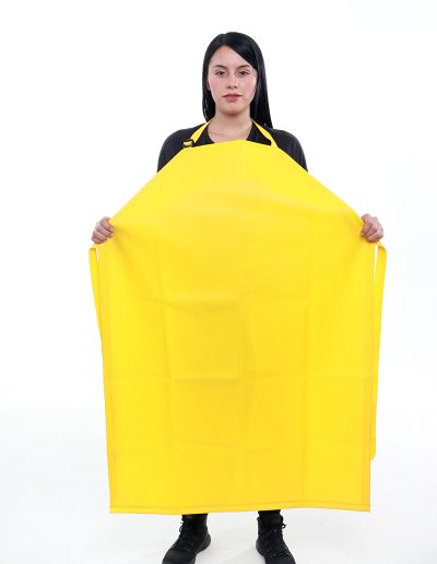 Woman wearing a yellow waterproof apron