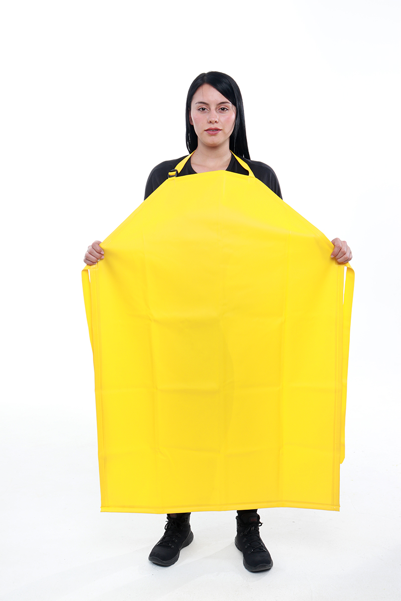 Woman wearing a yellow waterproof apron